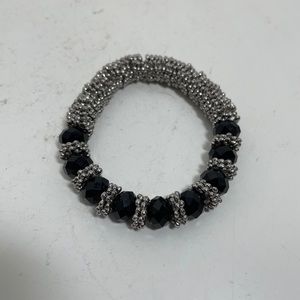 Black crystal elastic stretchable bracelet with silver toned metal desks